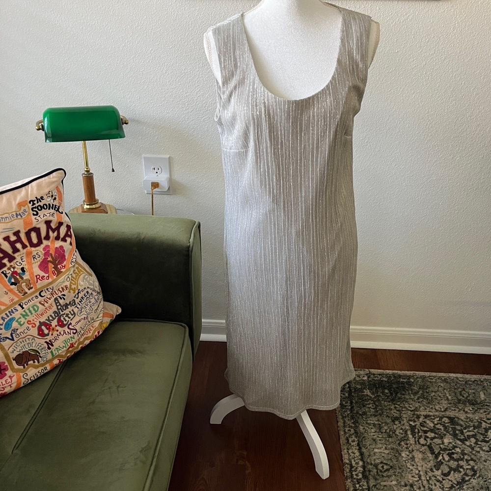 Dazzling silver dress by R&M Richards. Size 16.
